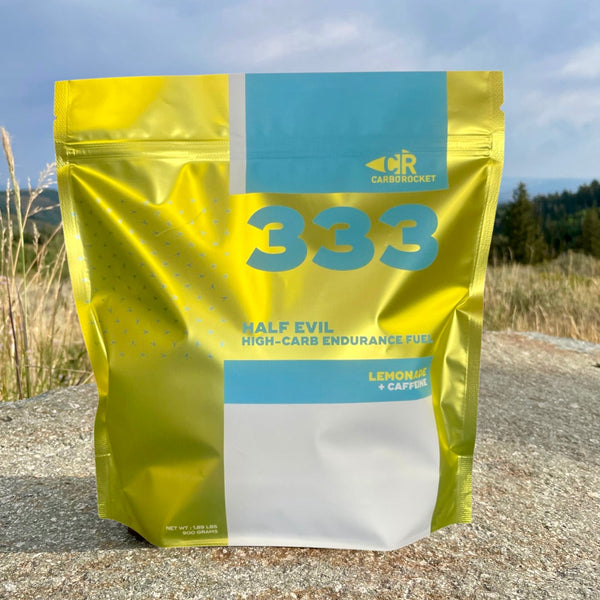 Yellow and blue package labeled '333' with a scenic background